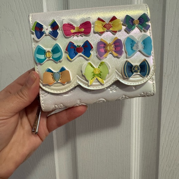 Loungefly Handbags - Loungefly White Iridescent Mini Wallet with Colorful Bow Appliqués